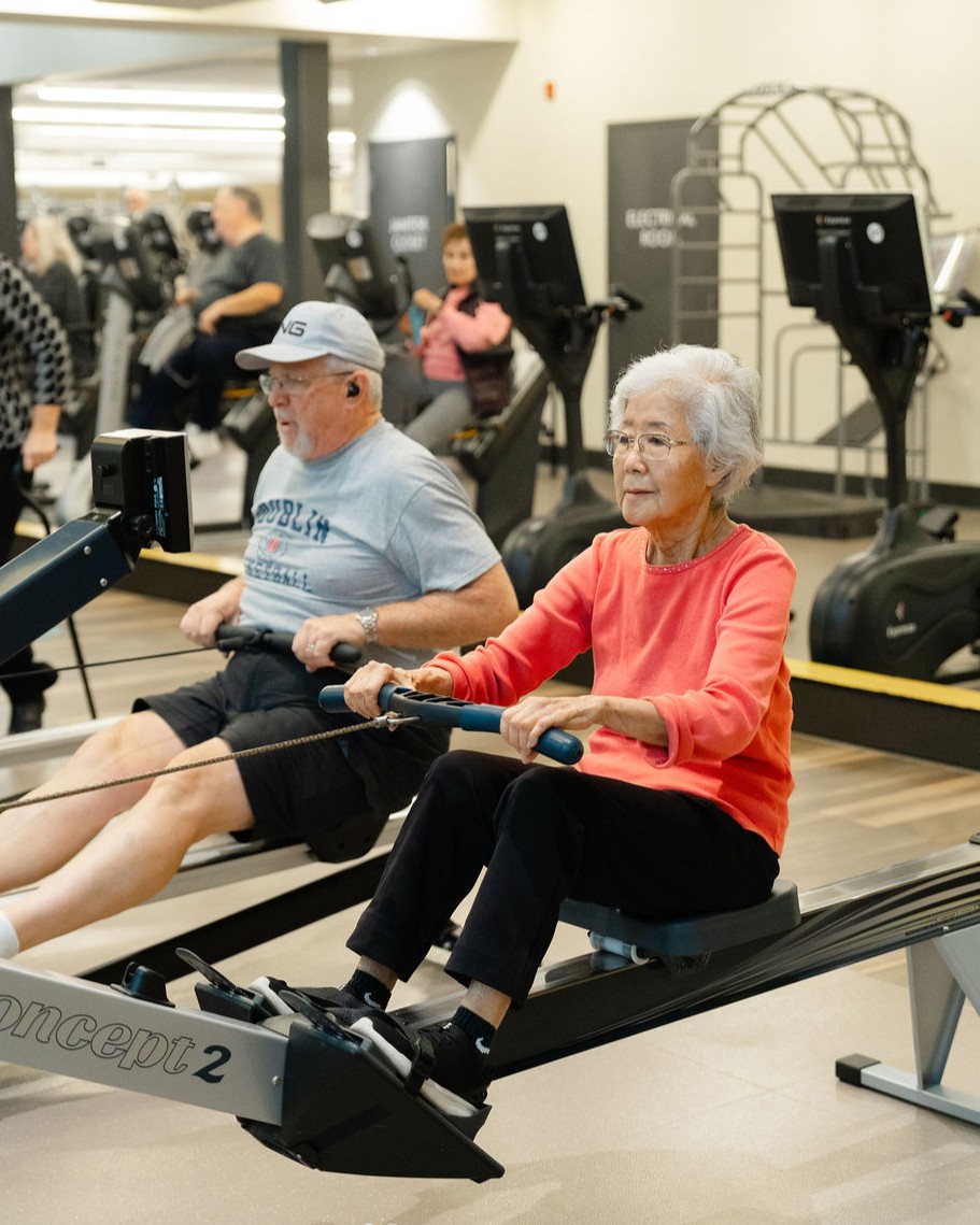 2 residents on row machine