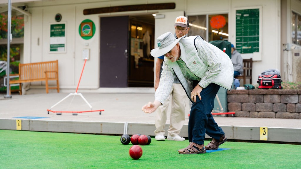 A resident tosses a ball