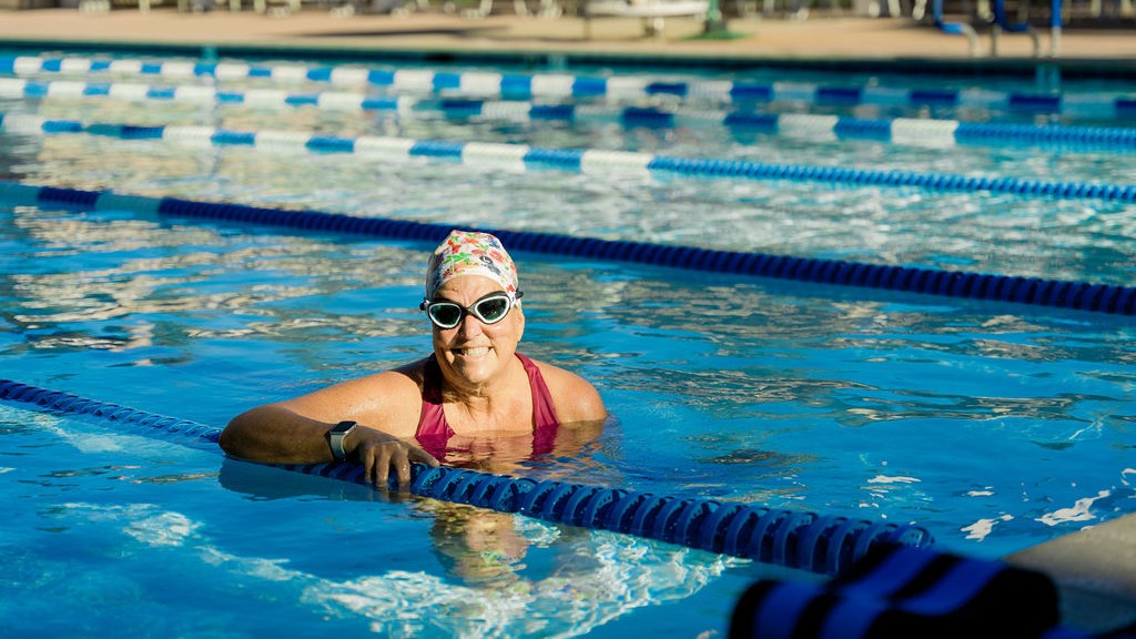 Swimmer poses in water